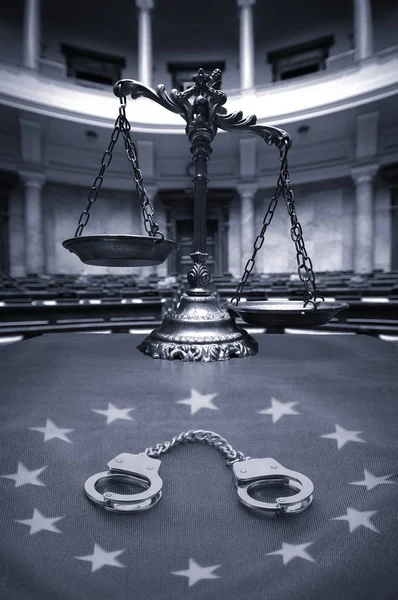 Symbol of law and justice in the empty courtroom, law and justice concept.