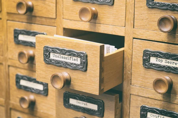 The Archives Card Catalog , old wooden file catalog box, index , database, archive and library concept.
