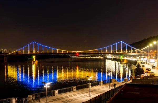 Bridge with blue and yellow light at night — Stock Photo, Image