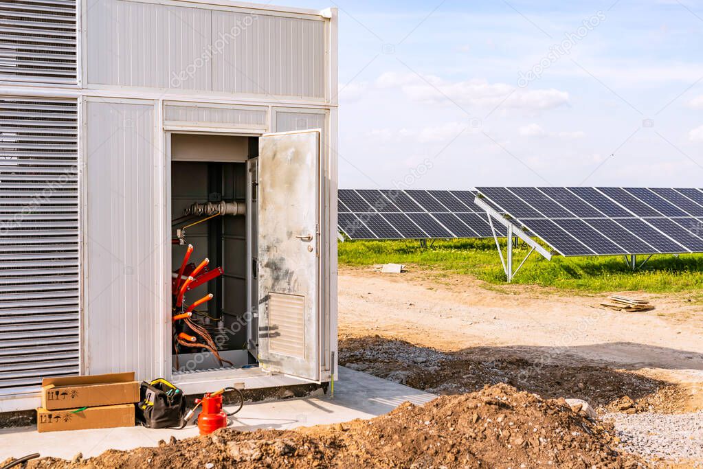 End cable clutches in transformer on solar panels background