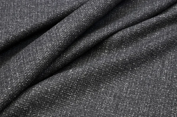 Fabric suit, tweed dark gray of cashmere and wool.