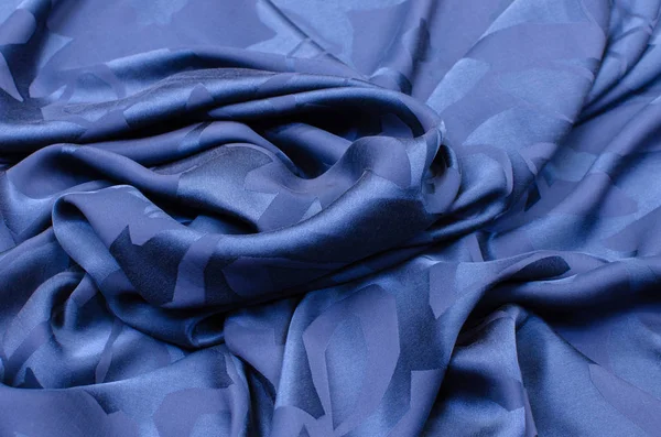 Cotton fabric satin blue with an ornament