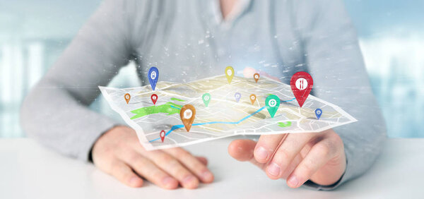 man holding 3d rendering pin holders on a map