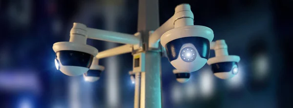 View of a Street security cctv camera filming a night city  - 3d rendering