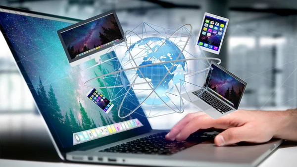 一个商人持有的计算机和设备显示在未来的界面与国际网络 — 图库照片