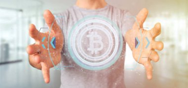Teknoloji Bitcoin simgesi üzerinde daire tutan adam görünümünü