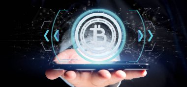 Bir teknoloji Bitcoin simgesi üzerinde bir daire 3d render tutan bir adam görünümü