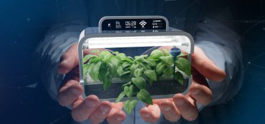 Bağlı bir dijital bitkisel bitki tutan bir Businesmann görünümünü  