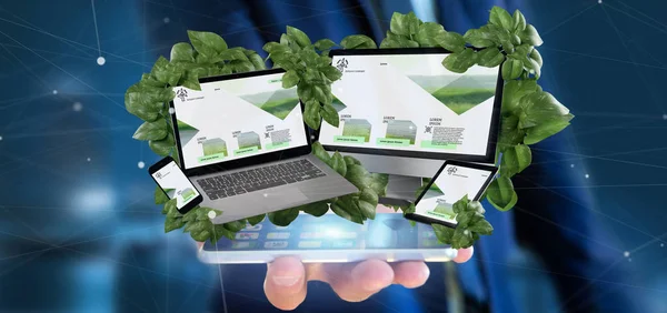 View of a Businessman holding connected devices surrounding by leaves 3d rendering