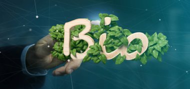 3d render etrafında yaprakları ile ahşap logo bio tutan bir işadamı görünümünü