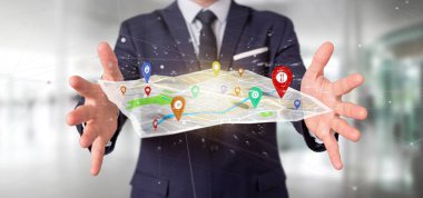 Pim tutucu bir harita üzerinde render 3d tutan bir işadamı görünümünü