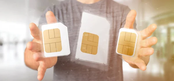 Ansicht eines Geschäftsmannes mit unterschiedlicher Größe einer Smartphone-Sim-Karte 3d-Rendering — Stockbild Ansicht Eines Geschäftsmannes Mit Unterschiedlicher Größe Einer Smartphone Sim Karte — Stockfoto