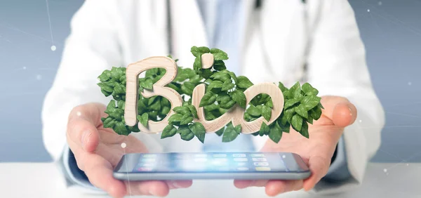 View of a Doctor holding Wooden logo bio with leaves around 3d rendering