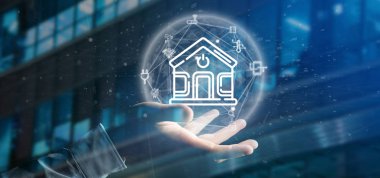 Simge, istatistikleri ve da ile akıllı ev arayüzü tutan işadamı