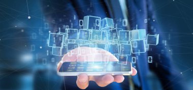 Blockchain küp ve ikili veri 3 bulutu tutan işadamı