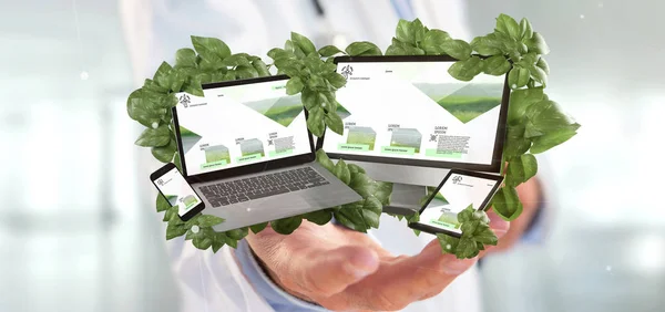Médico segurando um dispositivos conectados em torno de folhas 3d rend — Fotografia de Stock
