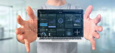 İş kullanıcı arabirimi veri ile laptop tutunarak işadamı 