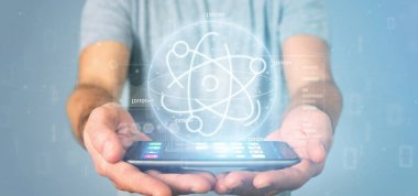 Veri ile çevrili bir atom simgesi tutan işadamı