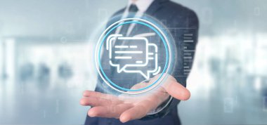 Bir mesaj simgesi tutan işadamı 