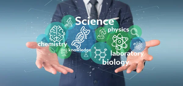 Businessman holding Science icons and title — Stock Photo, Image