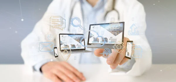 Doctor holding a Devices connected to a cloud multimedia network — Stock Photo, Image