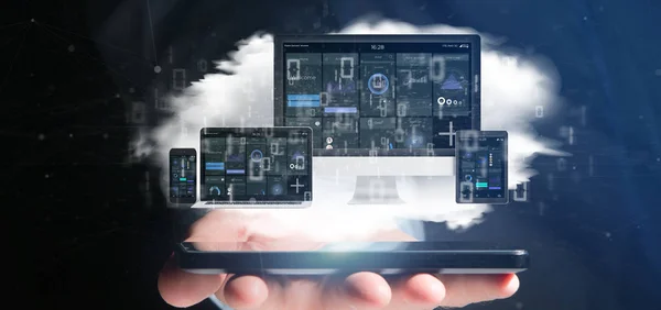 Affärsman som håller enheter anslutna till ett moln multimedia netw — Stockfoto