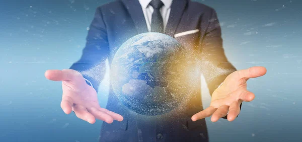 Affärsman som innehar en 3d-rendering partiklar jorden världen — Stockfoto