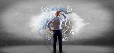 Dünya küresi önünde ekoloji simgeleri ve bağlantı 3D görüntüleme ile çevrelenmiş bir iş adamının görüntüsü