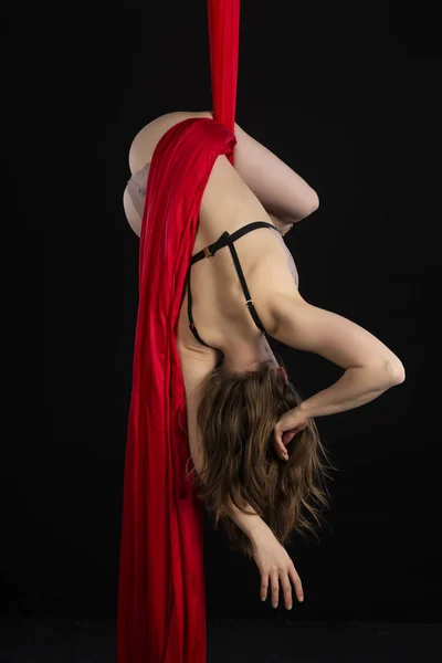 Petite Athletic Brunette Acrobat Suspended Red Silk — Stock Photo, Image