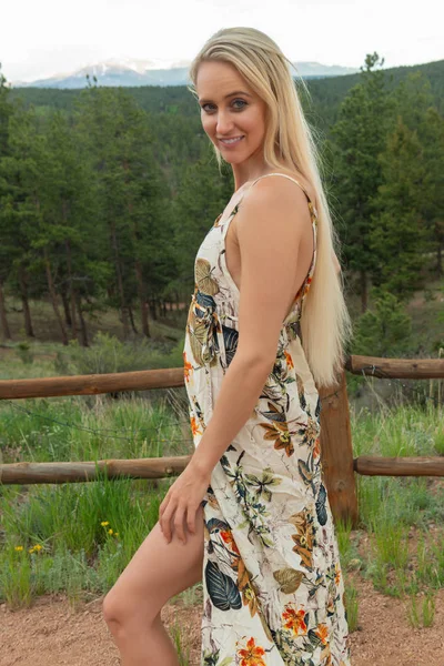 Blonde in a long white dress — Stock Photo, Image