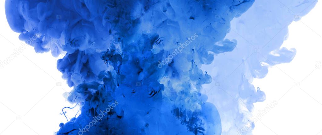 Acrylic blue colors and ink in water. Abstract painting background. 