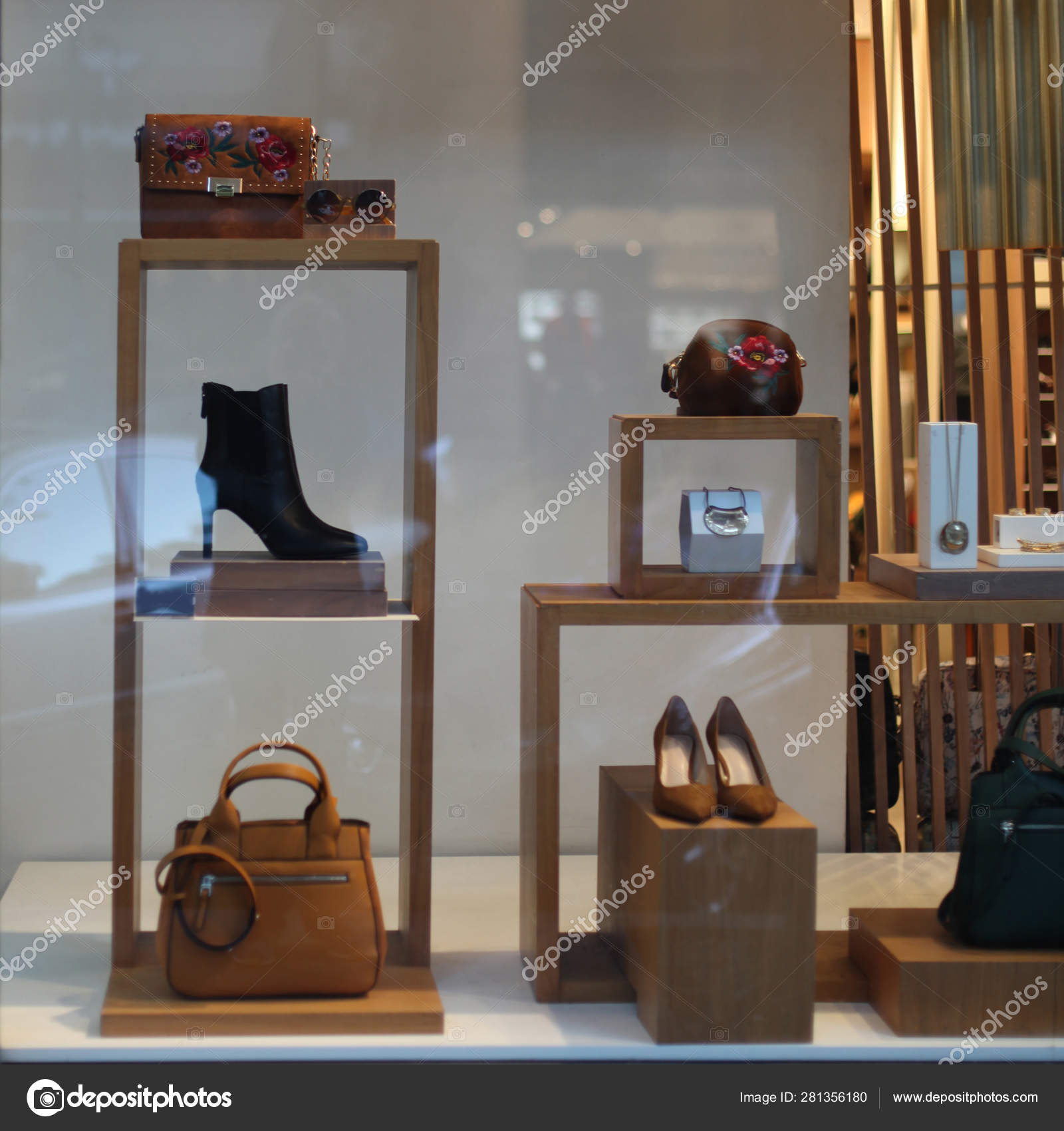 Shop window with shoes, bag and accessories. Stock Photo by