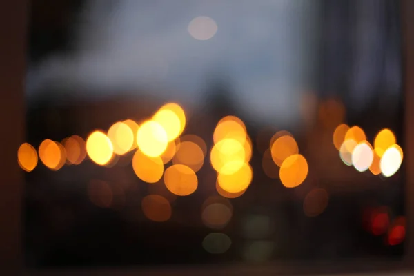 Abstract stad licht vervagen knipperende achtergrond. Zachte focus. — Stockfoto
