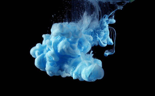 Acrylic colors in water. Ink blot. Abstract background.