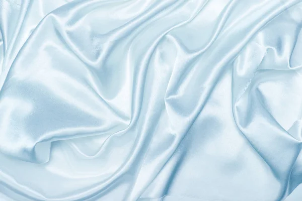 Abstrakt blå silke tyg bakgrund — Stockfoto