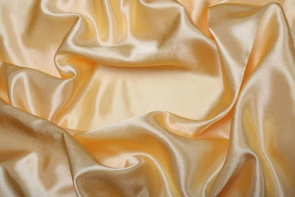 Abstract gold silk fabric background — Stock Photo, Image