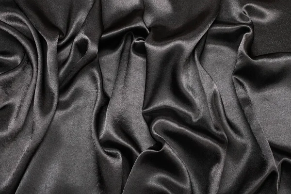 Black silk fabric background — Stock Photo, Image