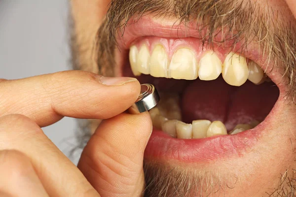 Man Going Swallow Battery Holds Batery Fingers Side View Closeup — Stock Photo, Image