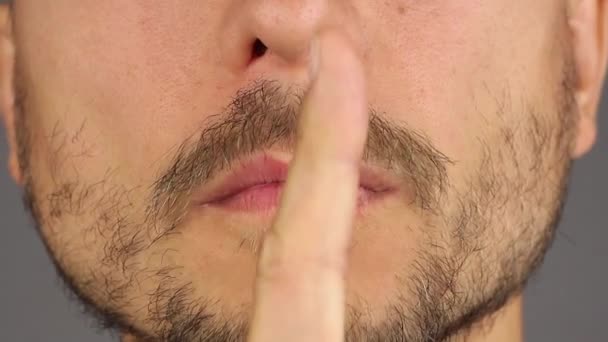 Man Puts His Finger His Lips Gesture Silence Secret Closeup — Stock Video