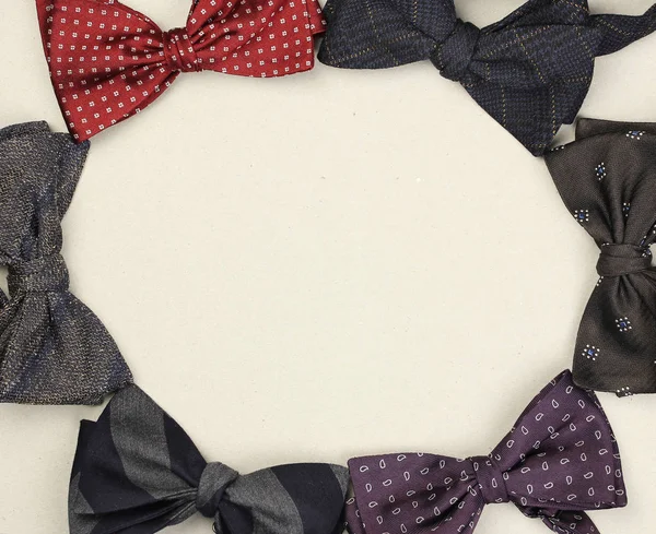 Bow Ties Arranged Circle Cardboard Background Congratulatory Texts Top View — Stock Photo, Image