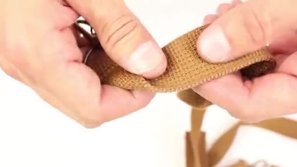 Human Hands Testing Brown Belt Bag White Background — Stock Video