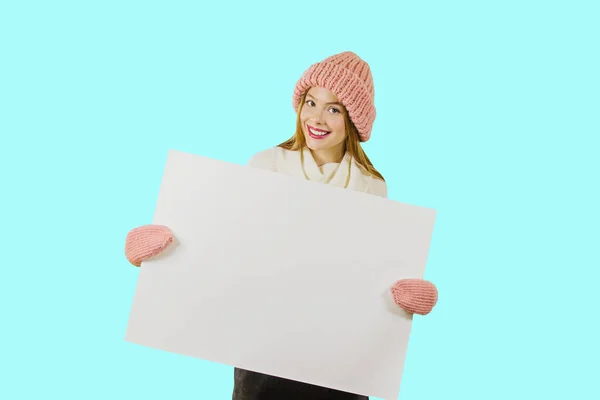 Woman holding a blank A3 poster — Stock Photo, Image