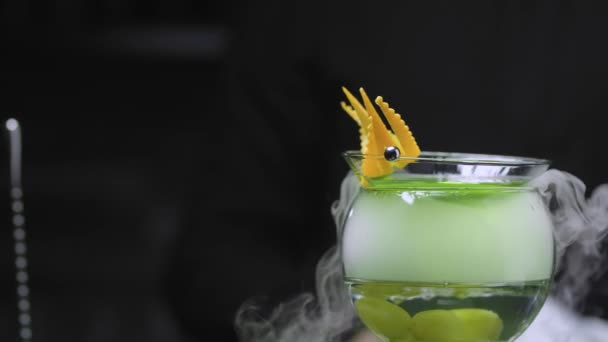 Grape Martini Cocktail cooling in a glass with dry ice — Stock Video