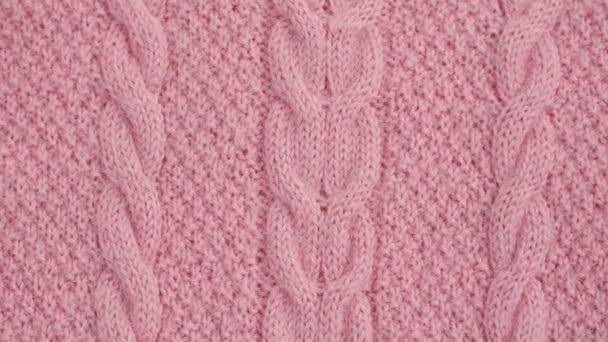Gestrickter Stoff aus rosa Wolle — Stockvideo