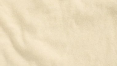 Fildişi yün örgü kumaş.