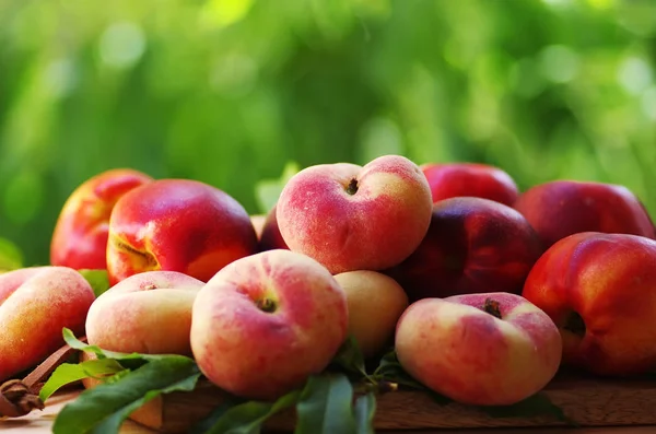 Ripe Peaches Leaves Table Stock Image