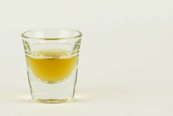 Shot Glass Whiskey White Background Copy Space Right Side — Stock Photo, Image