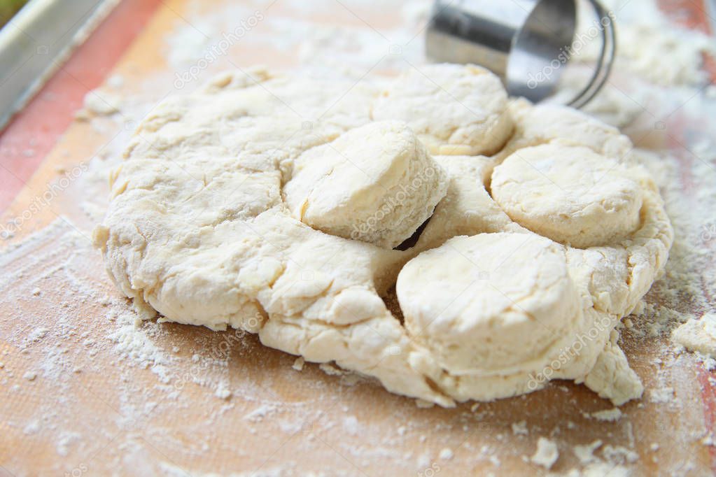 Cutting out Southern-style biscuits with room for text