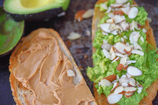 Avocado peanut butter sandwich with almonds
