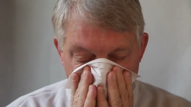 Senior Man Blows His Nose Very Thoroughly — Stock Video
